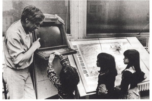 Iannis Xenakis at the Center for Mathematical and Musical Automation explains the basic operation of the Polyagoga to students. CEMAMu (Centre d’Études de Mathématique et Automatique Musicales), likely in the late 1970s